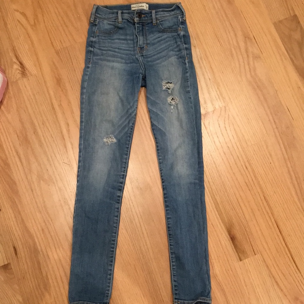 Distressed denim jeans